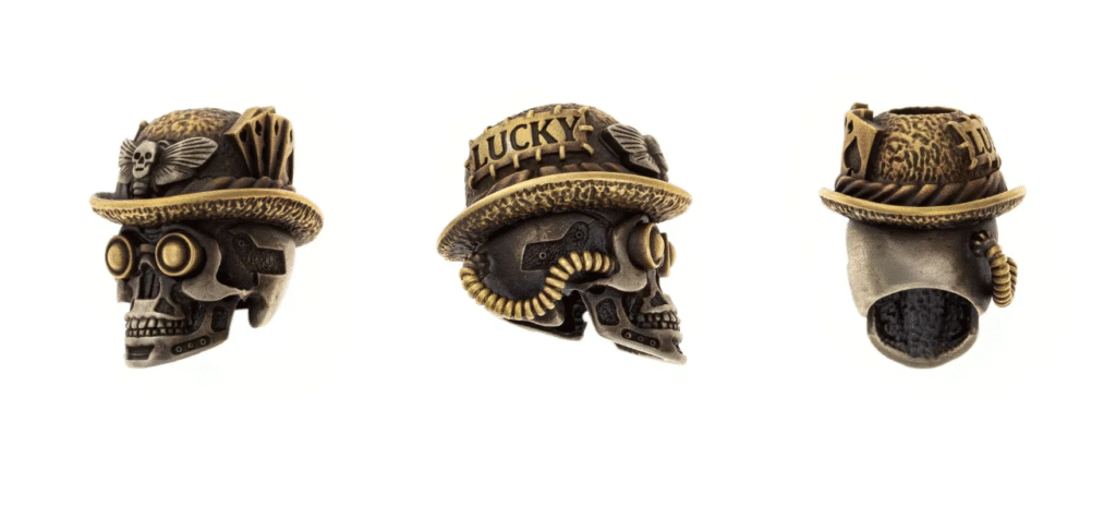 Skull bead wearing steampunk goggles and a hat with playing cards, custom beads for paracord bracelets and knife lanyards.