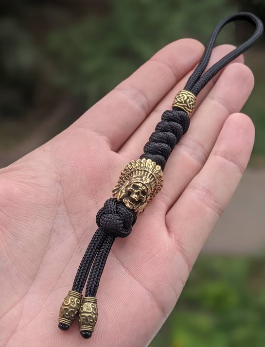 Natural patina development on brass paracord beads - fresh golden versus aged brown finish