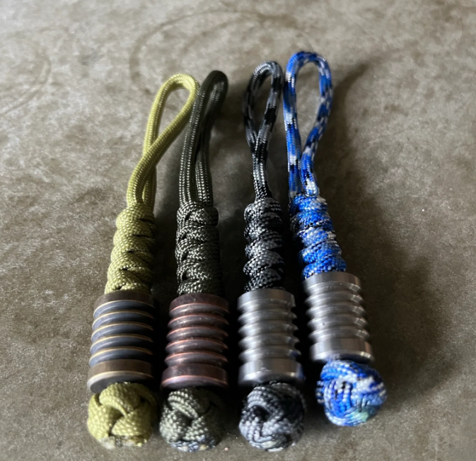 Comparison of titanium beads and other materials used for paracord accessories.