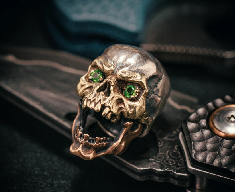 Skull beads paired with different paracord colors including black, red, camo, and contrasting combinations